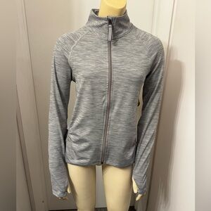 All in motion. New .XS. Top full zip.